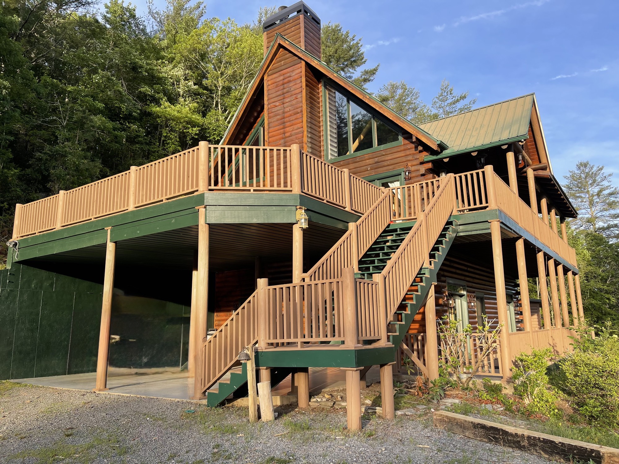 Owltown cabin exterior at golden hour